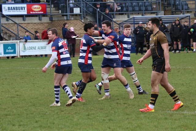 Banbury Bulls celebrate one of their tries in their fine win over Camberley. Picture by Simon Grieve