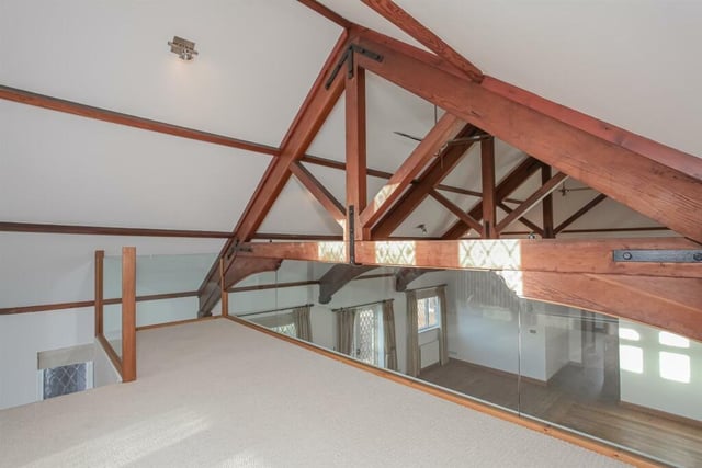 Stairs lead to an attractive mezzanine floor above the main room.