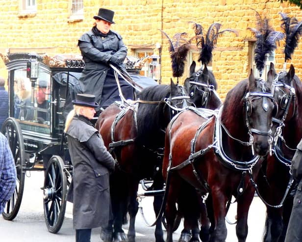 The courtege arrives at the gate of St Mary's Church, Bloxham for the funeral service
