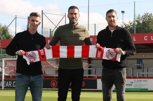 New Brackley boss Roger Johnson with his management team of Kevin Foley (left) and Stephen Ward