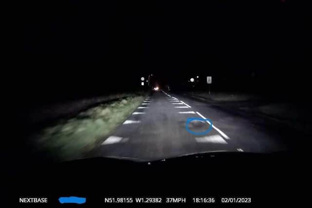 A pothole at Clifton shown in a dashcam footage image published on Fix My Street, showing how hard it is to see the pothole in the dark