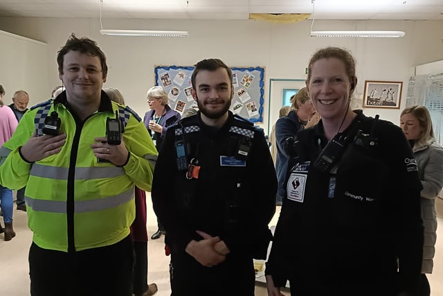 Police community support officers Harry and Samuel alongside community warden Helen.