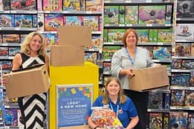 Liz Swift, retail liaison manager at Castle Quay, with members of The Entertainer team.