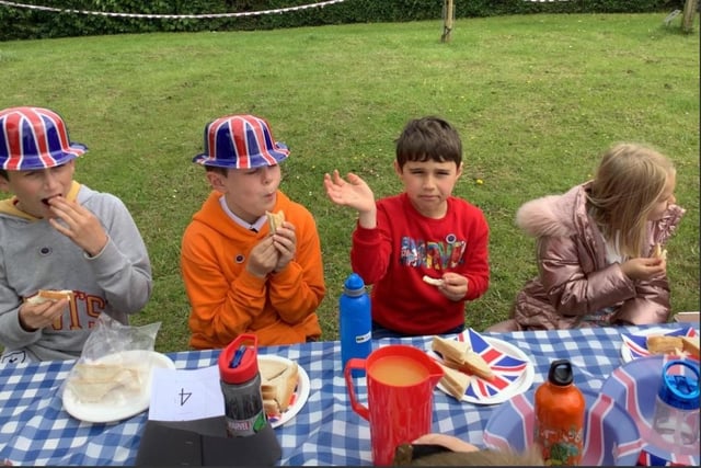 The children at Wroxton CE Primary School enjoyed a feast of sandwiches,  pastries and most importantly jelly and ice-cream. Every child in school was presented with a special Jubilee pin badge, courtesy of Friends of Wroxton parent group.