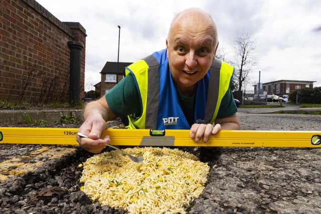 Mark Morrell, aka Mr Pothole, fixes a pothole with Pot Noodle as the first step in his new potty campaign