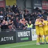 Banbury United celebrate one of their goals in the 3-3 draw at Scarborough Athletic on the final day of the National League North season. Picture by Julie Hawkins