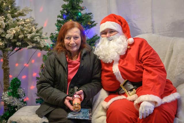 Christine, a resident at Highmarket House, was delighted to meet Santa