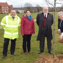 Sir Tony Baldry puts to finishing touches to the avenue while (from right to left) Cllr Phillips, Cllr Mallon, BTC’s landscape officer Julia O’Shea, and the council’s director of the environment Paul Almond look on.