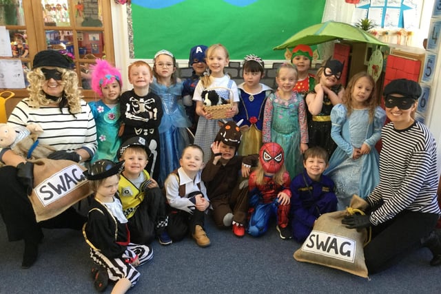 World Book Day photos from Broomhill First School - the Big Owls reception class are seen here with Burglar Bill and Burglar Betty! If you have a stripy T-shirt and dark trousers for your little one, Burglar Bill is easy to create. Make a mask out of black-painted card and some elastic and stuff some scrunched-up paper into a pillow case tied with string to make a simple swag bag