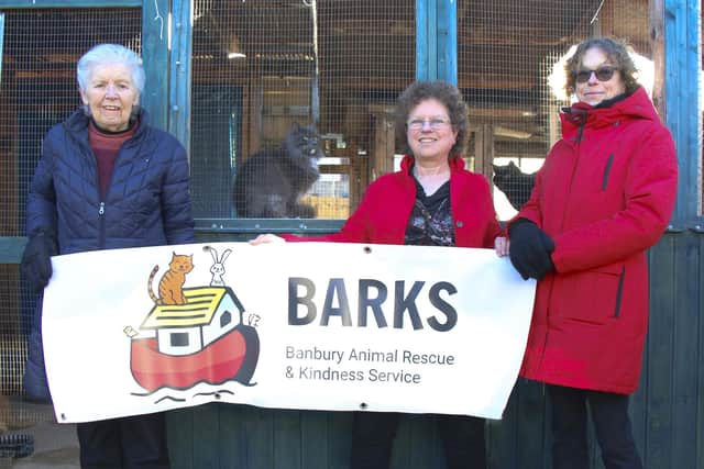 Ann Collins (centre) and two of BARKS' volunteers who help care for the unwanted pets on a daily basis