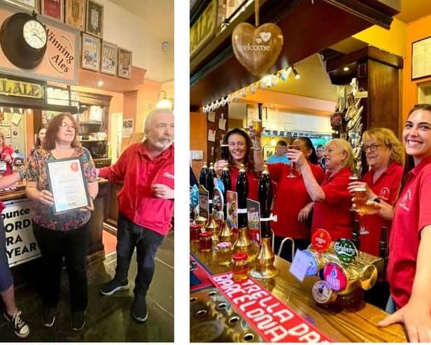 Staff at the White Horse celebrating being named Pub of the Year 2024.