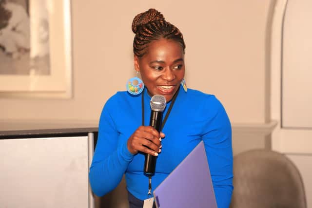 Angela Karanja speaking to an audience at a recent event