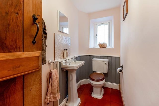 The house has a small cloakroom featuring a toilet on the ground floor.