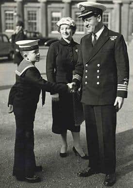 Vyvian Howard with wife Bernadette and son, also Vyvyan, after receiving the DSC in 1957