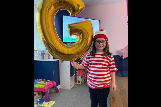 Georgie age 7 as Where's Wally?