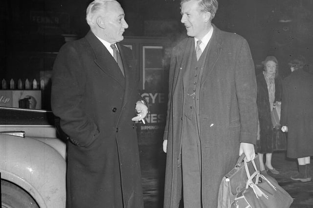 Jo Grimond, the leader of Liberal Party, arrives at Waverley Station to be greeted by Sir A Murray in February 1956.