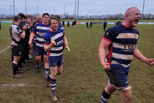 The Banbury Bulls players show their delight after their vital win over Royal Wootton Bassett. Picture by Simon Grieve