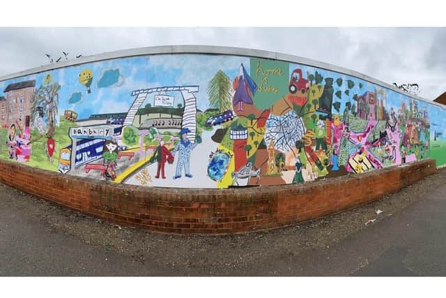 Around 200 people have helped to create a large, colourful mural close to the centre of Banbury.