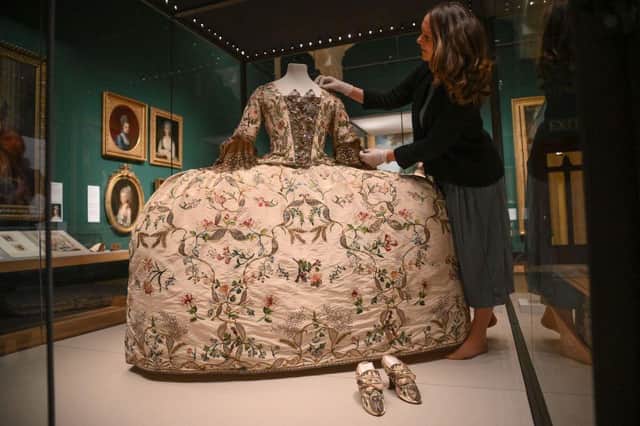 A British court dress including ornate shoes, from Style & Society: Dressing the Georgians at The Queen's Gallery, London. Prof McCormack will talk about shoes through this period at a talk in Banbury. Picture by Getty