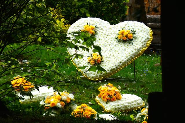Floral tributes, among many, to Peter Smith of Smiths of Bloxham who died on April 14