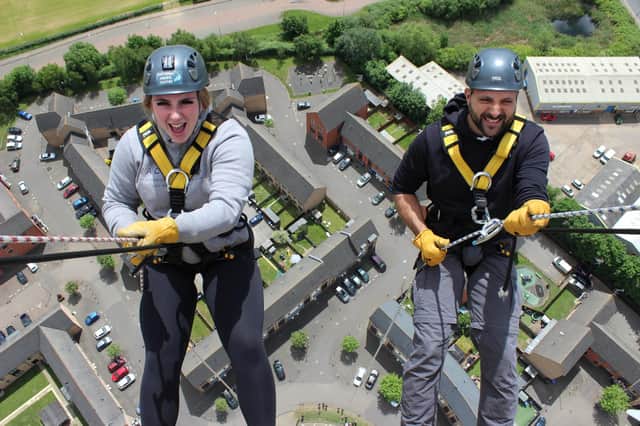 Dion Bishop and Pat Blank taking part in the Katharine House Hospice abseil in 2022.
