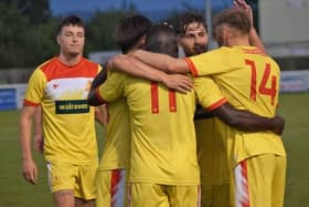 The Banbury United players celebrate one of their goals in the 3-1 pre-season friendly win at Evesham United on Tuesday night. Picture by Julie Hawkins