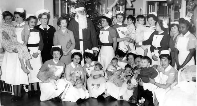 The Christmas party at the Holbech children's ward at the Horton General Hospital with Uncle Jim Cannon as Santa Claus
