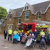 Residents and staff at Glebefields Care Home in Banbury honoured their local firefighters by inviting the local fire crew from Banbury Fire Station to the home for a safety briefing for celebrate International Firefighters Day on May 4. (photo from the care home)