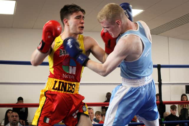 Banbury Boxing Club's George Lines (in red) v Charlie James of Earlsfield ABC (South London)  Pictures by Josh Blincowe