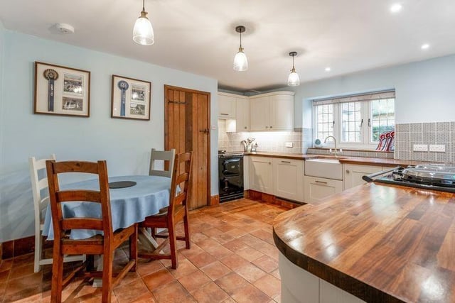 The kitchen and dining room area has been fitted with a range of modern units and drawers and has space for a dishwasher and oven.