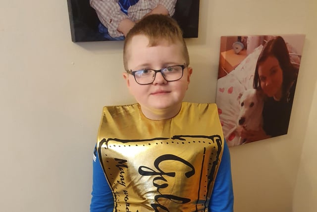 Laura Amos sent in this image of seven-year-old Logan, dressed as a golden ticket from Charlie and the Chocolate Factory.