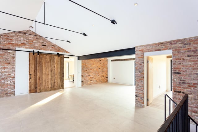 The house has a cinema room, sauna and plant room and access to the sunken courtyard garden with an adjacent independent gym or home office room.