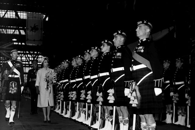 The Queen and Duke of Edinburgh arrive at Waverley Station from Clackmannan in June 1963. The Queen is pictured inspecting the Argyll & Sutherland Highlanders.