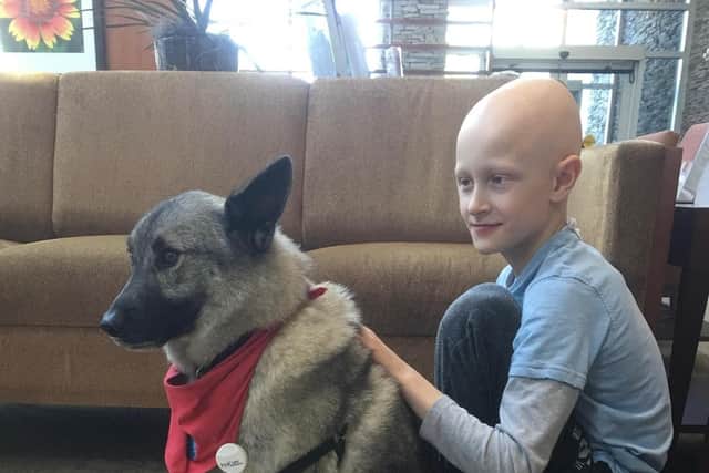 Oscar and Indy - a PAT therapy dog he met while having treatment in Oklahoma