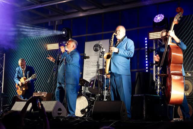 King Pleasure and the Biscuit Boys took to the stage in their blue suits and a boogie set with lots of brass and an upright bass. Photo: Chris Roberts/WiderView Visual Media