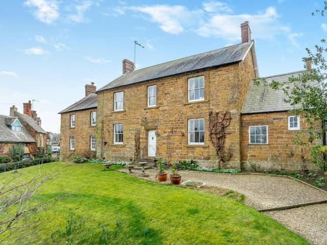 The Georgian style property sits on a raised plot of land within Great Bourton.