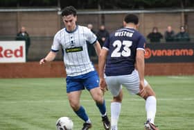 Joe Wilson in possession for Banbury at Buxton on Saturday. Photo: BUFC.