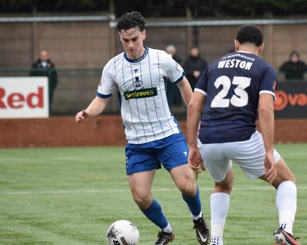 Joe Wilson in possession for Banbury at Buxton on Saturday. Photo: BUFC.