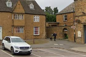 The Friends Meeting House is through a gate in the old wall between Church House, Horsefair and the People's Park