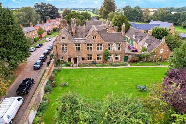 The building is built from local Hornton stone and has extensive gardens and grounds.