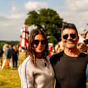 Simon Cowell at the Park Fair on Saturday, alongside partner Lauren Silverman and owner of the Great Tew Estate Saskia Johnston.