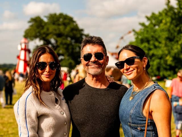 Simon Cowell at the Park Fair on Saturday, alongside partner Lauren Silverman and owner of the Great Tew Estate Saskia Johnston.