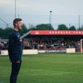 Interim boss Gareth Dean watches on during Brackley Town's play-off eliminator against Gloucester City on Wednesday night. Picture by Josh Nesden