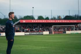 Interim boss Gareth Dean watches on during Brackley Town's play-off eliminator against Gloucester City on Wednesday night. Picture by Josh Nesden