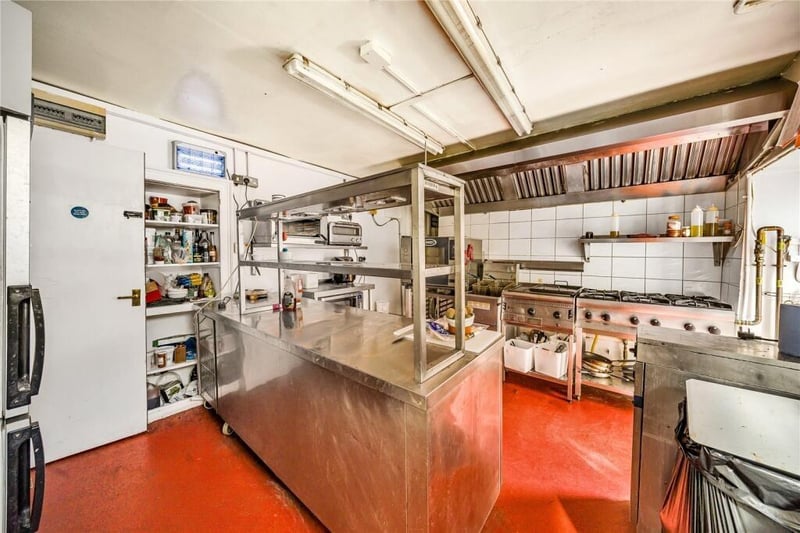The property contains a large operational kitchen space.