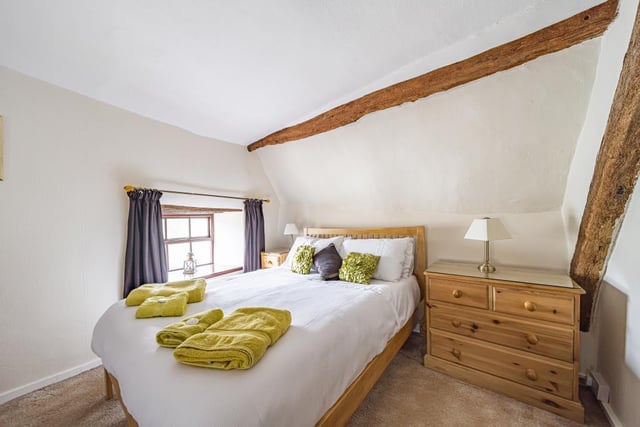 Exposed wooden beams give the cottage a warm and homely feel, whilst preserving the history of the property.