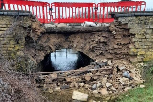 The 16th century bridge near Bicester was damaged by water last week.