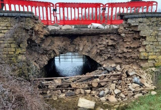 The 16th century bridge near Bicester was damaged by water last week.