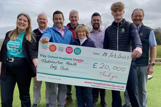Members of the Tadmarton Heath Golf Club with their cheque for the Horton.