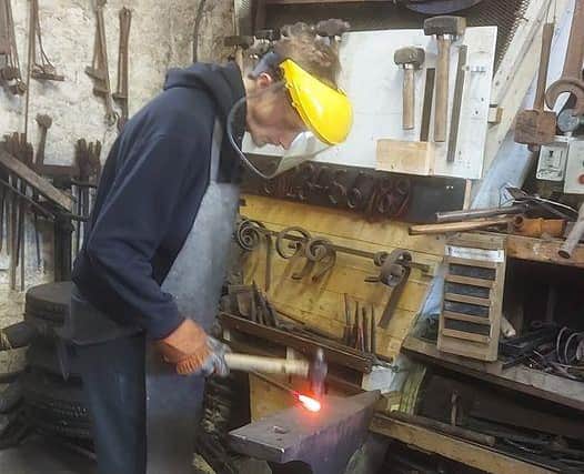Oscar's bucket list included blacksmithing. He made some impressive iron-work during his day at Combe Mill